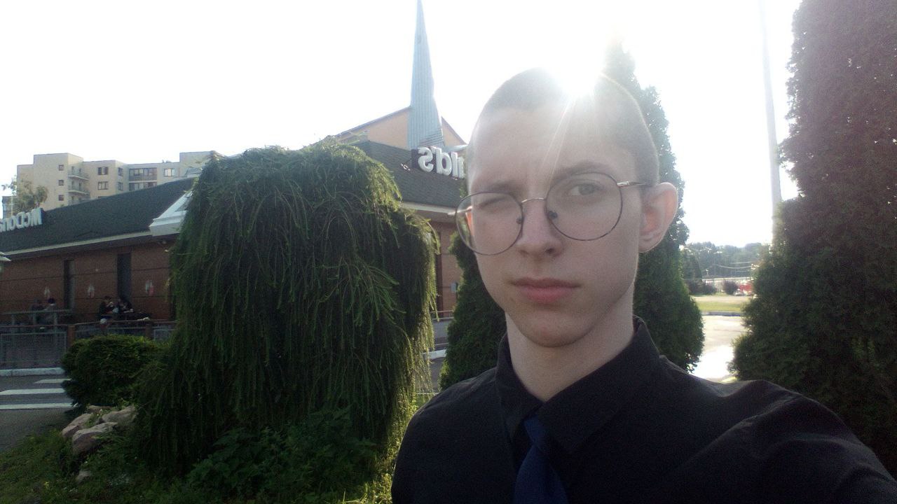 Me in GEL uniform in front of my McDonald's workplace in 2025.